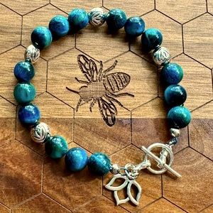 Turquoise color tiger eye and lotus bracelet
